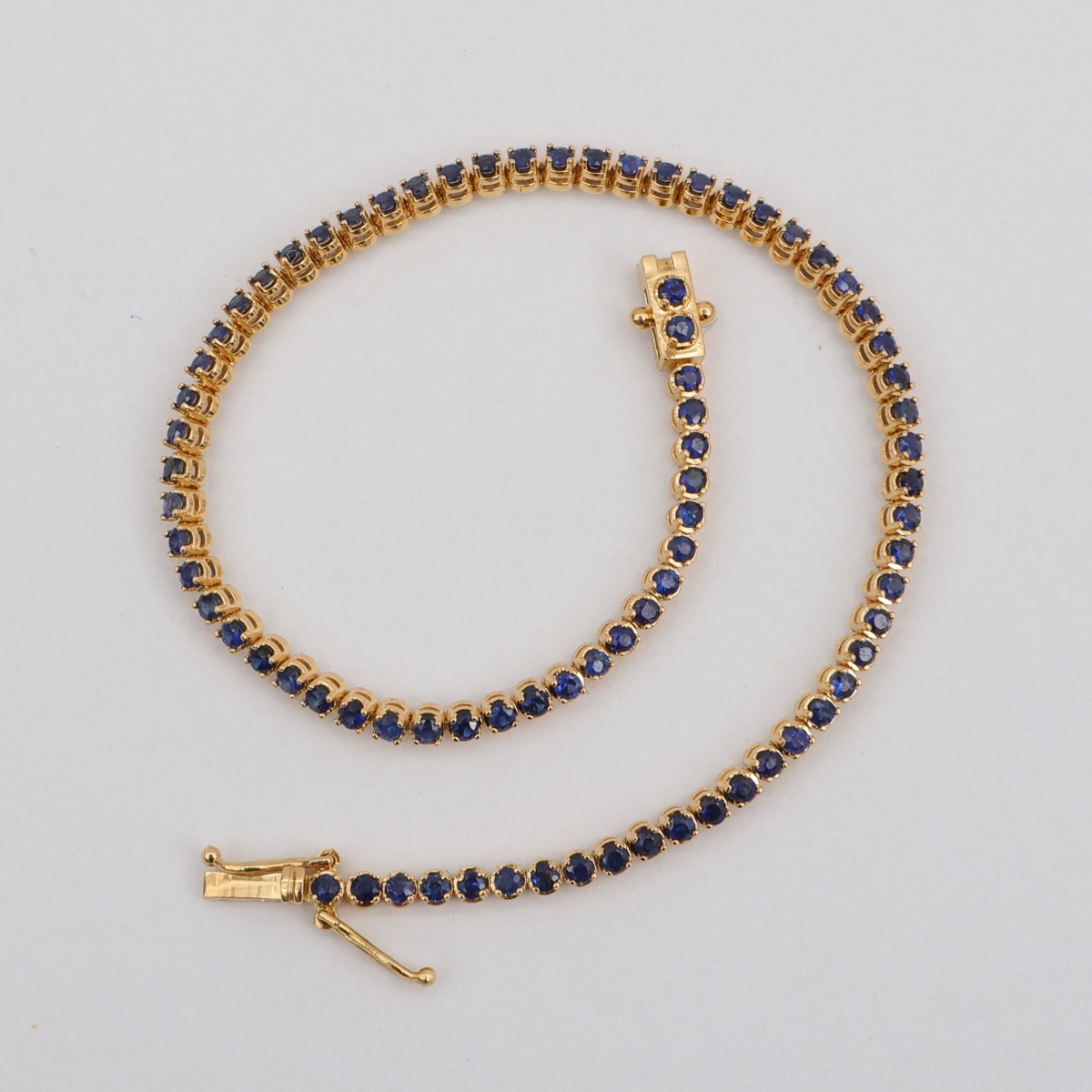 Pulsera Tenis Oro Amarillo y Zafiros