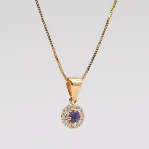 Dije Flor Oro Amarillo y Zafiro Morado