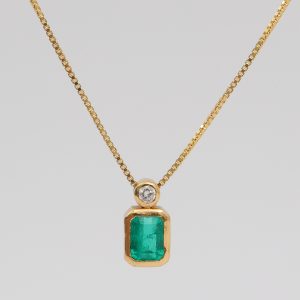 Dije Oro Amarillo y Esmeralda